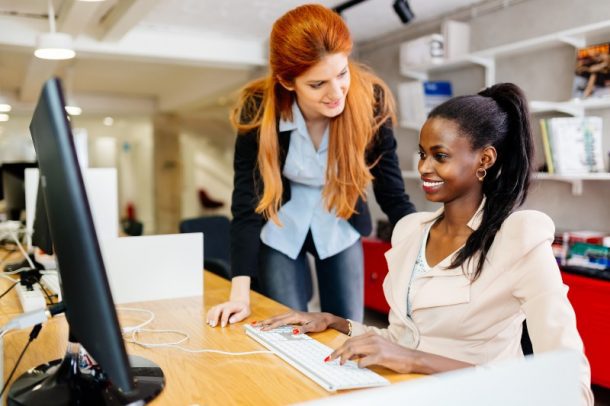 Businesswoman supervising employee